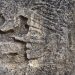 Kriegerfigur an einer Säule des Templo de los Guerreros